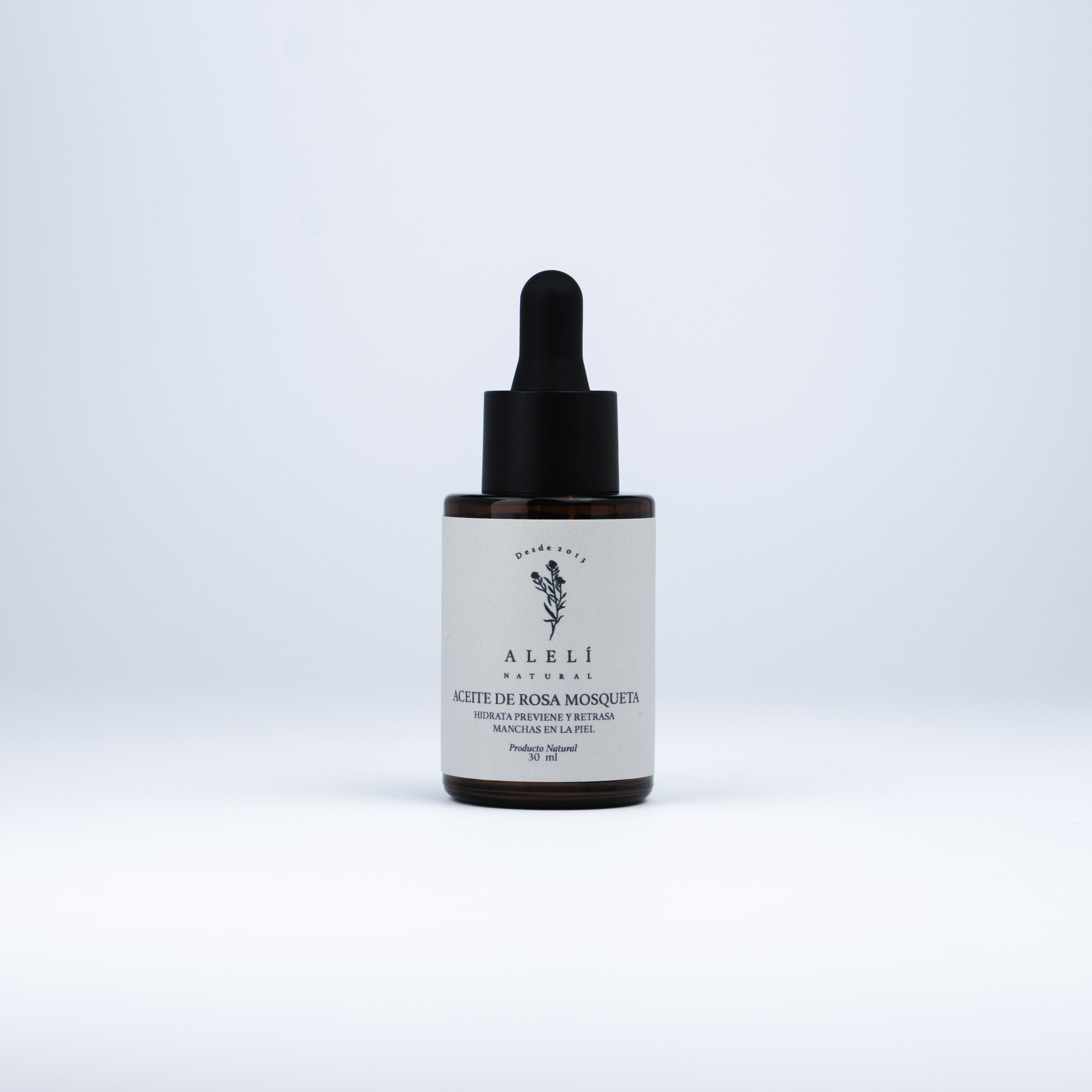 Frontal del Aceite de Rosa Mosqueta Alelí Natural de 30 ml, gotero ámbar y etiqueta minimalista.