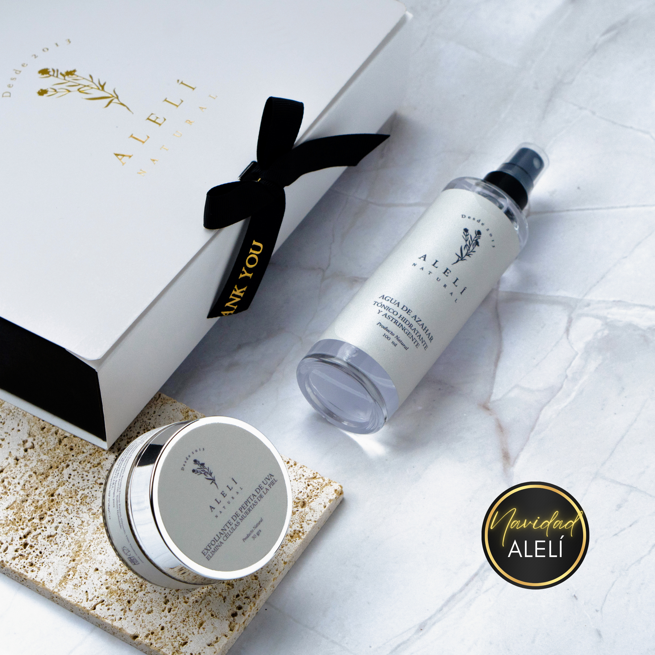 Vista frontal del Pack Momento Exfoliación Alelí Natural con exfoliante facial de pepita de uva y tónico oil control de agua de azahar. Navidad Alelí 35% Off.