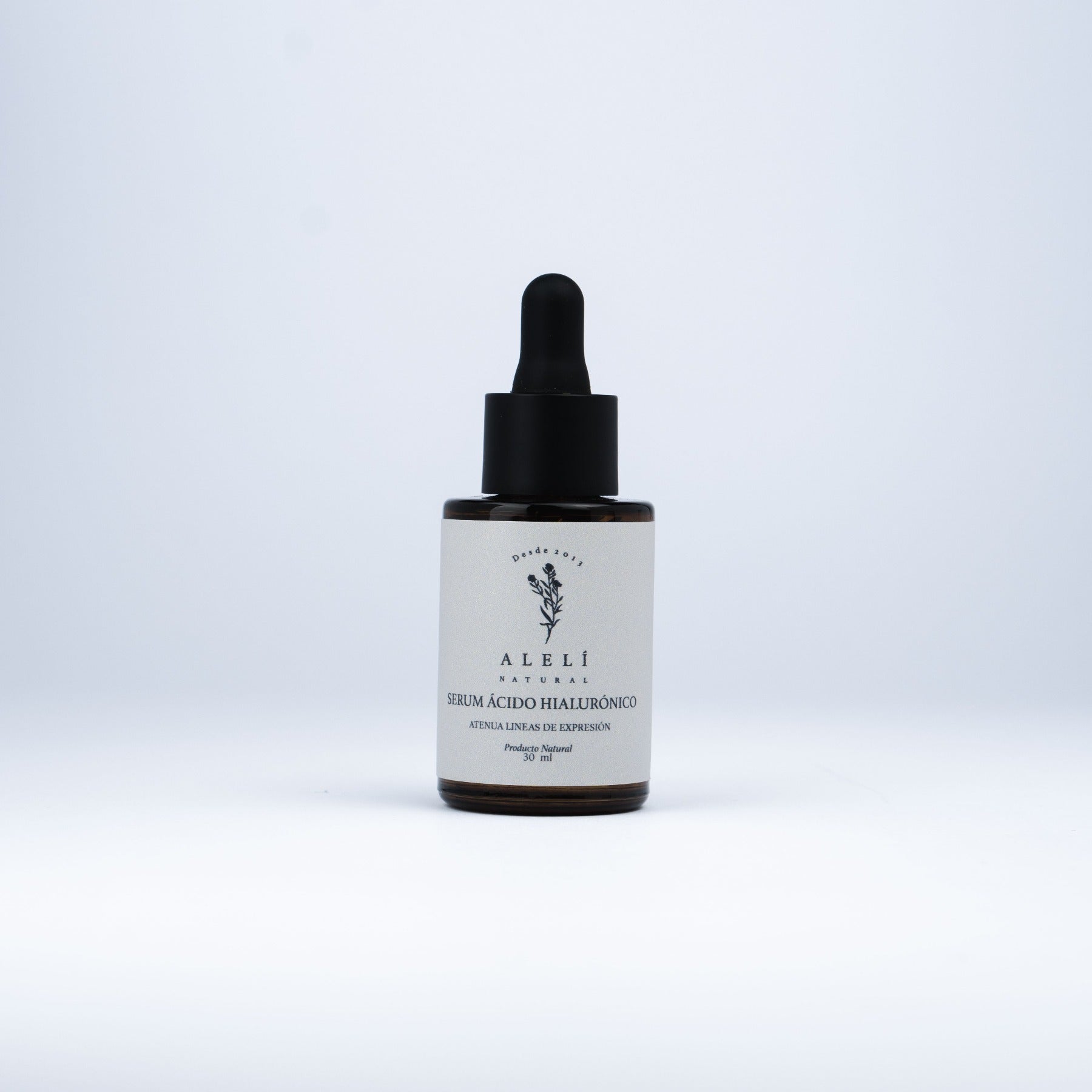 Vista frontal del Sérum Hidratante con Ácido Hialurónico Alelí Natural de 30 ml con envase gotero ámbar.