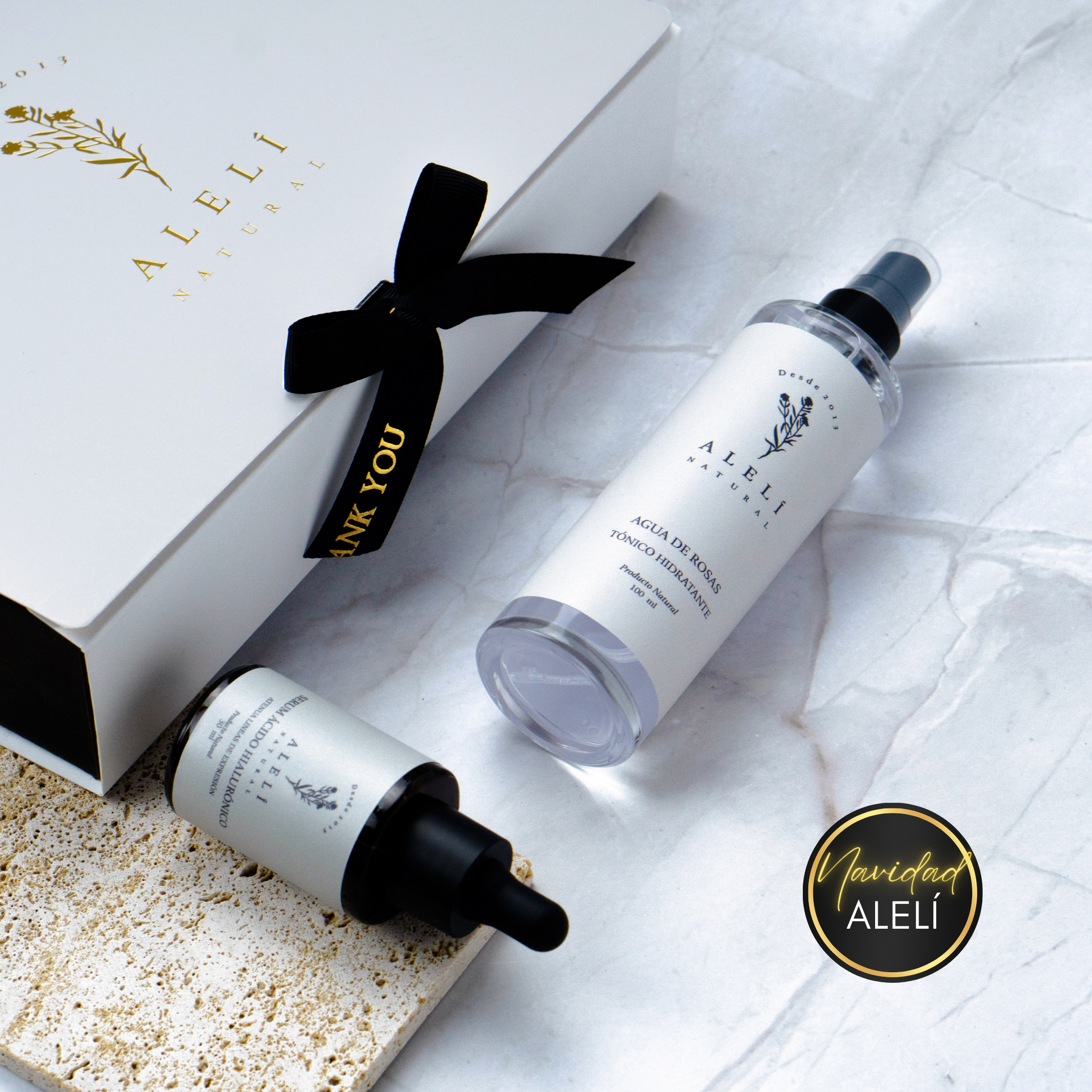 Vista frontal del Pack Doble Hidratación Facial Alelí Natural, que incluye Sérum de Ácido Hialurónico y Tónico de Agua de Rosas. Navidad Alelí 35% Off.