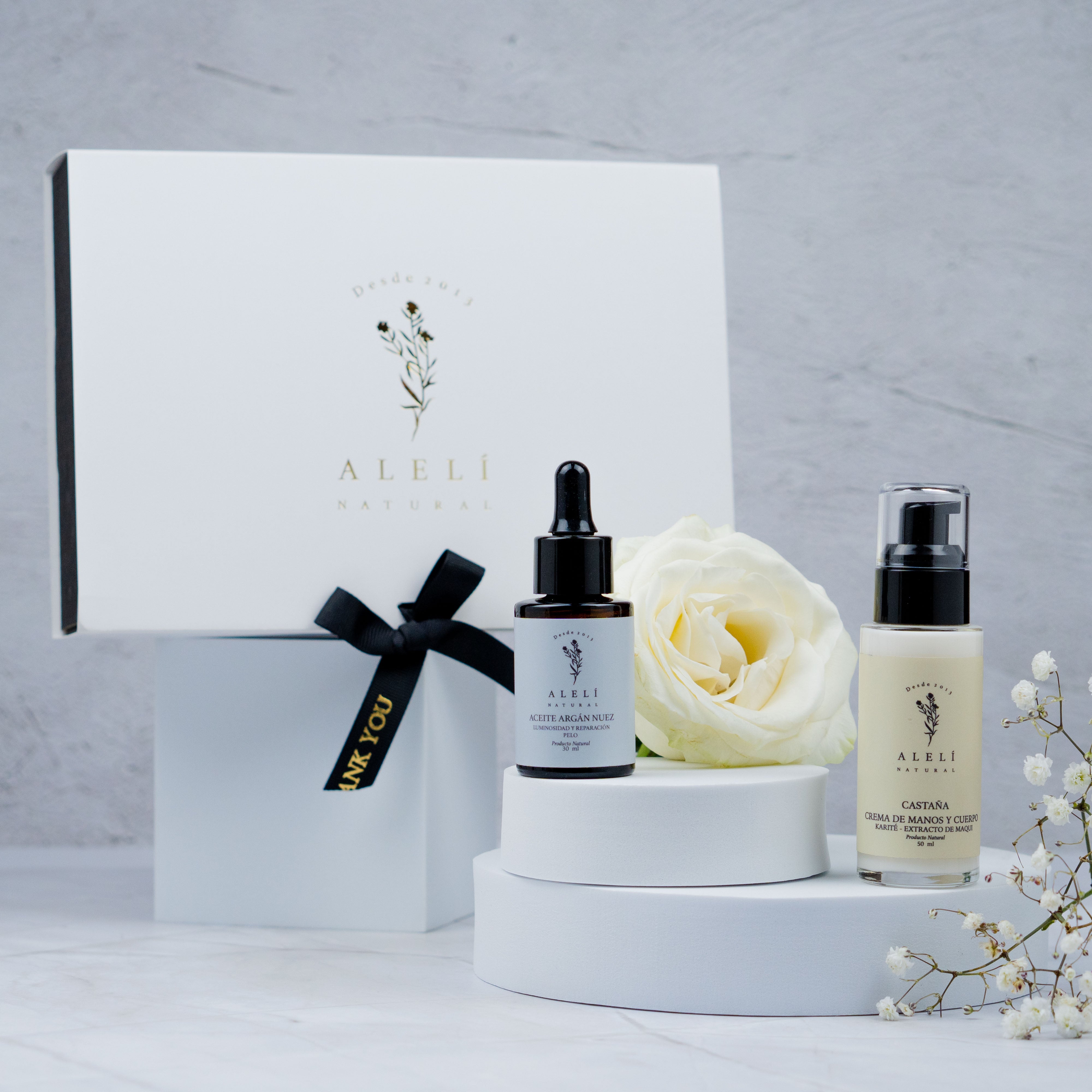 Pack Alelí Natural para el cuidado de manos y cabello con crema de karité y aceite capilar de argán y nuez. Caja de presentación.